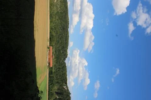 Barn with clouds above Stock Photos