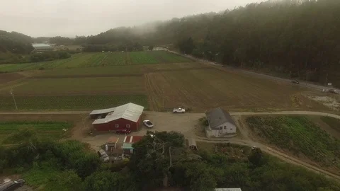 Barn, Farm Fields &amp; Road in Fog - Aerial Drone Stock Footage 71260091