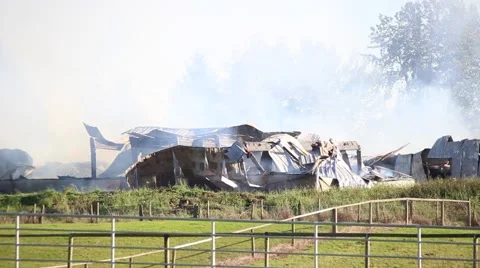 Barn fire with major wall collapse Stock-Footage 55769688