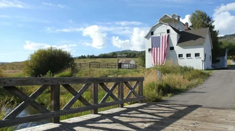 Barn flag and bridge wide shot Vídeos de archivo 54565954