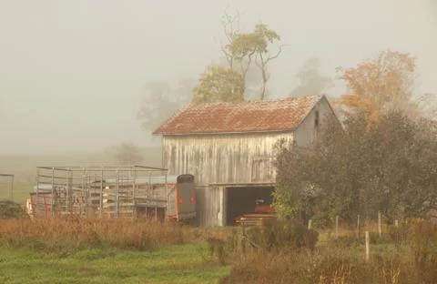 Barn in fog Stock Photos