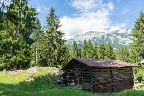 Barn in the mountains wit panoramic view Stock Photos