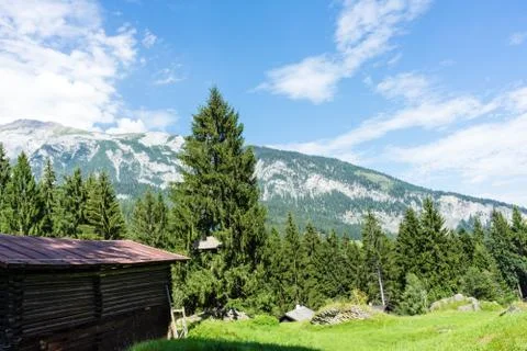 Barn in the mountains wit panoramic view Stock Photos