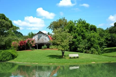 Barn with Pond in Front Stock Photos