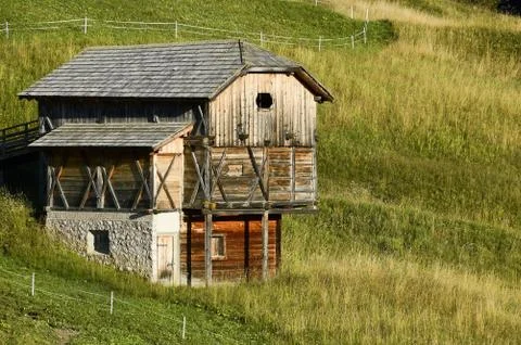 The barn on a slope Stock Photos