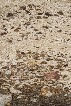 Barn stone wall - texture of an old stone wall Stock Photos