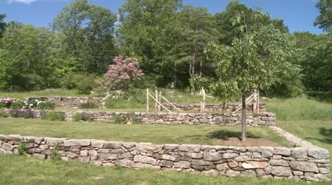 Barn with stone walled garden (1 of 2) Stock Footage 10786333