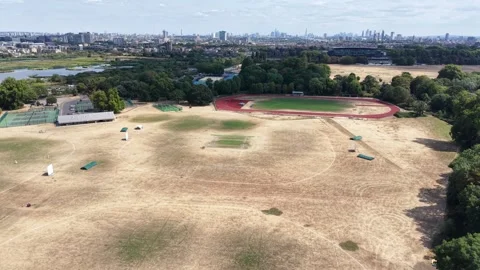 Barnes Oval Brook Cricket Ground During the 2026 Drought, London drone aerial Stock Footage 345153680