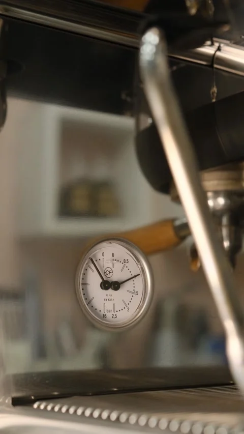 Barometer in coffee machine for control the brewing process when making espresso Stock Footage 264406462