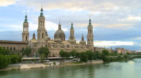 Baroque Basilica with cloudy sky at sunset by large river, time lapse Stock Footage 38716900