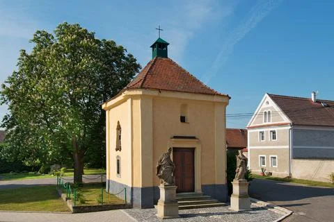 Baroque chapel with two statues Stock Photos