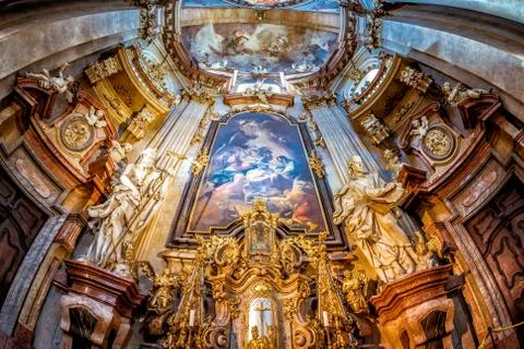 Baroque interior of St Nicholas Stock Photos