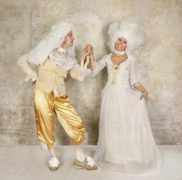 Baroque style couple dancing in the studio Fotos Stock