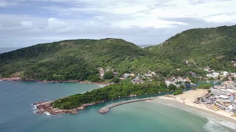 Barra da Lagoa Beach in Florianopolis, with its channel and lighthouse. Stock Footage 314531331