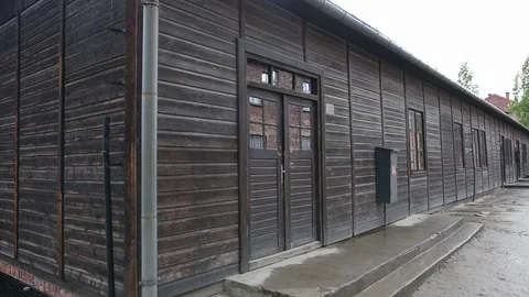 Barracks and concentration camp, one-storey building of dark wood 스톡 동영상 114635633