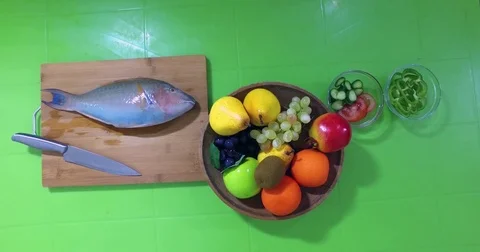 Barracuda on the cutting board  Stock Footage 76784147