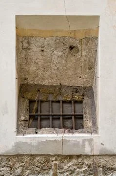 Barred Window, Crumbling Facade Stock Photos