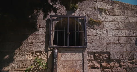 Barred Window in Stone Wall at Pula Castle Stock-Footage 335123577