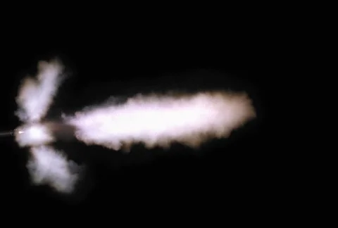 Barrel and muzzle flashes of M-16 rifle being fired Stock Footage 86884315