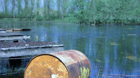 Barrel In Polluted Lake Video stock 22497496