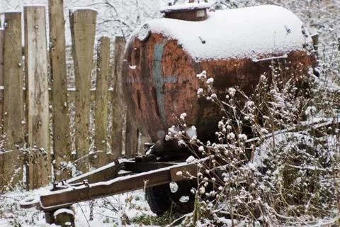 Barrel on wheels in the snow Stock Photos
