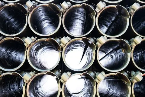 Barrels of multiple launch rocket systems, background Stock Photos