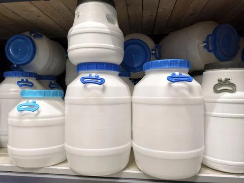 Barrels in various shapes, from compact to large, are neatly arranged on th.. Stock-Fotos