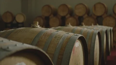 Barrels with  wine brandy whiskey in warehouse . Wine preparation fermenting Stock Footage 158708792