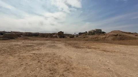 Barren Desert Landscape with Distant Building Stock Footage 305155096
