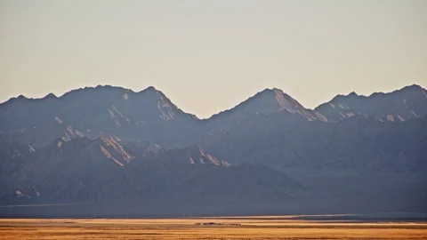 Barren Gobi desert with distant mountain range Stock Footage 326240670