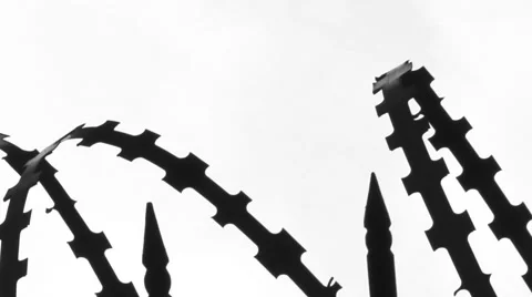 Barricade Made from Barbed Wire Against a White Hi-key Background. Stock-Footage 56285656