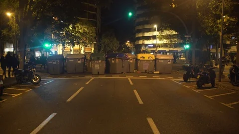 Barricade made of dumpsters during the pro Catalan independence riots in Barcelo Stock Footage 118125534