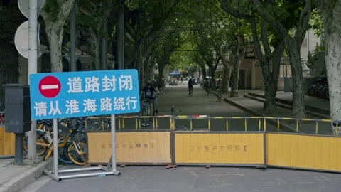 Barricade Set in Place to Limit Traffic During Shanghai Lockdown Stock Footage 195101557