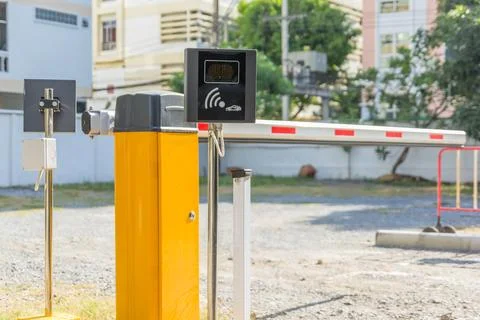 Barrier Gate Automatic system for security on the car parking. Entrance acc.. Stock Photos