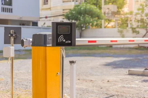 Barrier Gate Automatic system for security on the car parking. Entrance acc.. Stock Photos