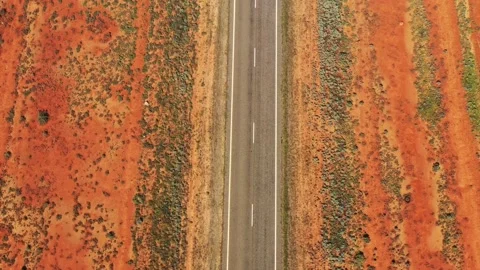 Barrier highway top down to blue sky lift view at outback roads aerial 4k. Video stock 169920637