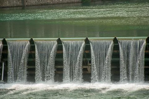 Barrier to slow down the flow of water Stock Photos
