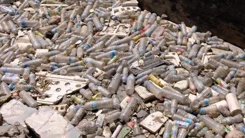 Barrier stopping plastic bottles and trash rubbish in canal from flowing in Stock Footage 337960108