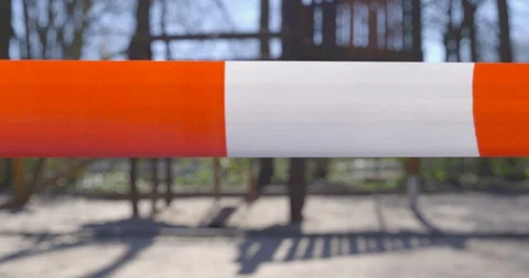 Barrier Tape - closed playground - camera pan Vídeo Stock 128891994
