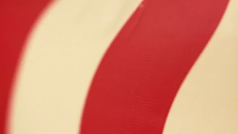 The barrier tape is red-white. Close-up. Gated technical fence Stock Footage 122857656