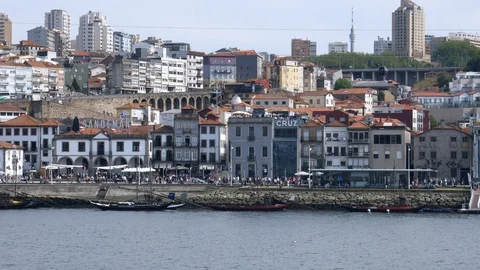 Bars and restaurants old town skyline of Vila Nova de Gaia, Porto, Portugal - 4K Stock Footage 107324259