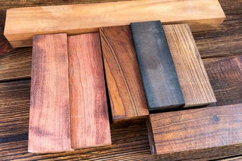 Bars blocks scales of valuable exotic tree wood ironwood, cocobolo, kingwood, Stock Photos