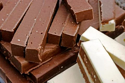 Bars of classical and white chocolate Stock Photos