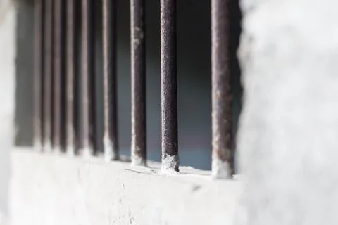 Bars in jail Stock Photos