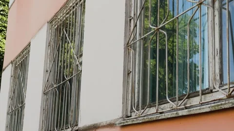 Bars on old windows in the house 库存影片 306171524