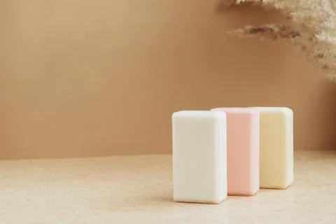 Bars of soap made from natural raw materials beige background. Organic cosmetics Stock Photos
