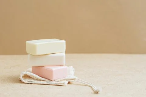 Bars of soap made from natural raw materials beige background. Organic cosmetics Stock Photos