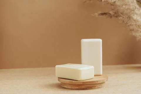 Bars of soap made from natural raw materials beige background. Organic cosmetics Stock Photos
