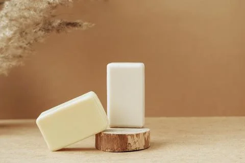 Bars of soap made from natural raw materials beige background. Organic cosmetics Stock Photos