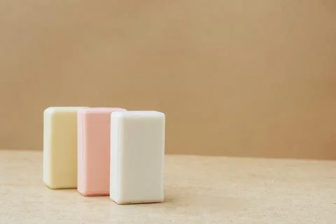Bars of soap made from natural raw materials beige background. Organic cosmetics Stock Photos